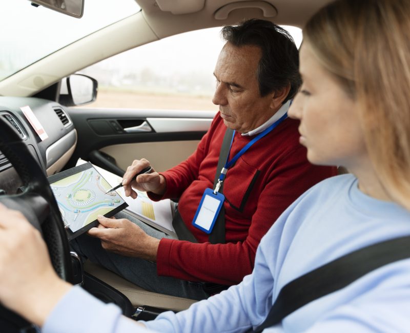 person-taking-driver-s-license-exam