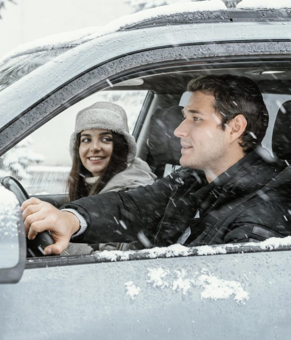 side-view-couple-together-car-while-road-trip